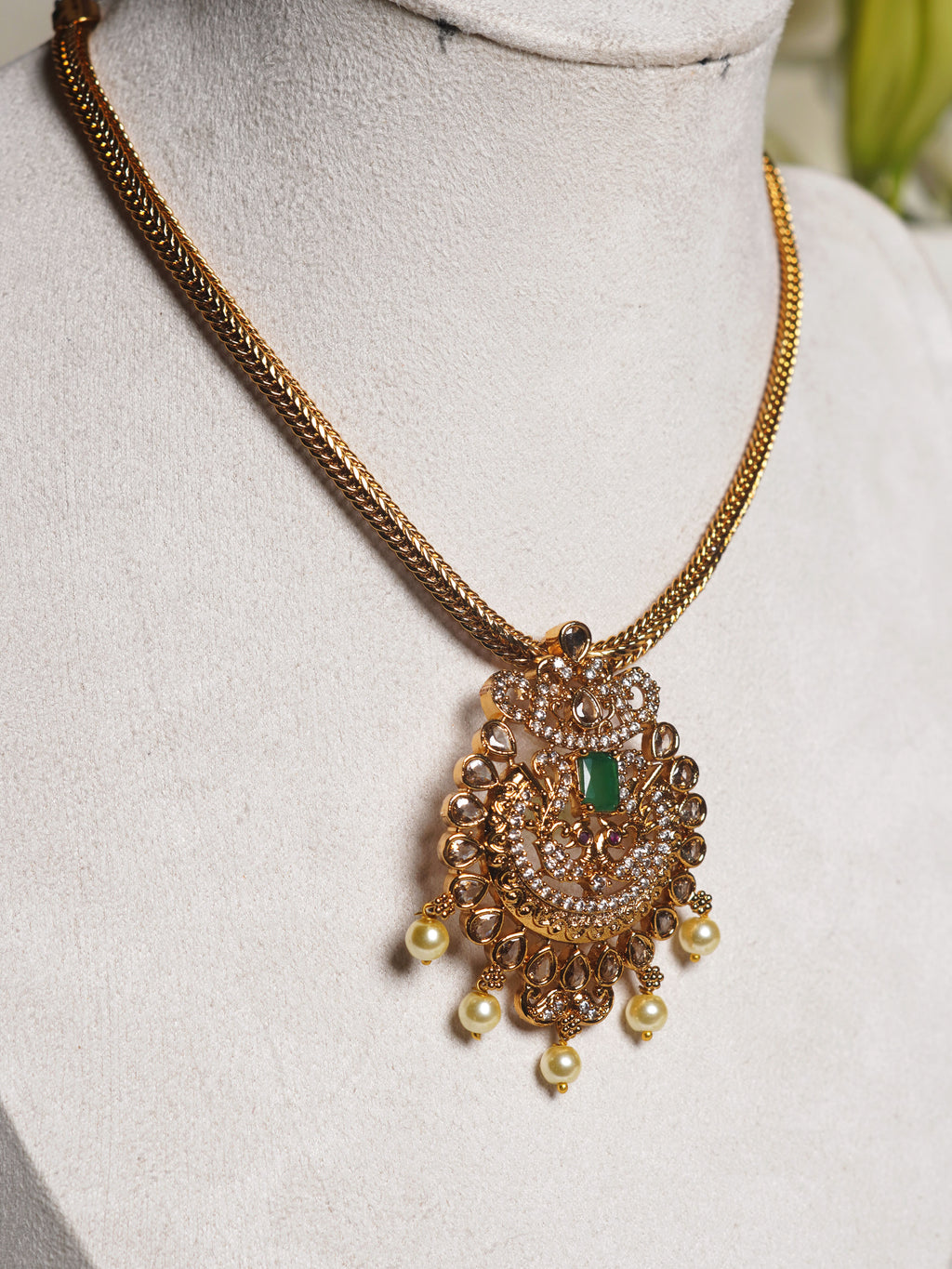 Emerald-Tone Ornate Kundan Pendant Necklace